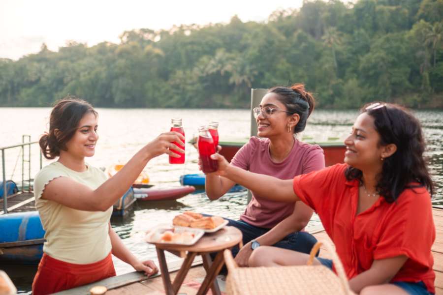 Team members kayaking on Chapora River in Goa