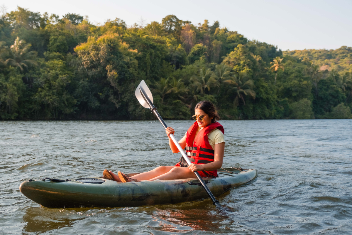 tourist-enjoying-kayaking-on-chapora-river