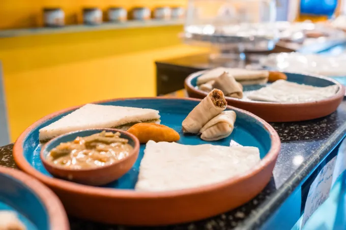 In South Goa, the markets and kitchens buzz with life. You’ll see how trade, fresh produce, and a mix of cultures blend into Margao’s food and community spirit.